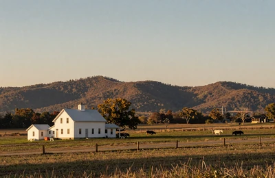 Tennessee farm country with cattle pasture and rolling foothills