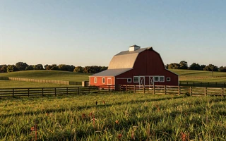 Rural countryside with red barn, gateway to country lifestyle dating on MuchDating